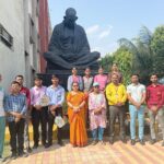 Students of Srinath University and Srinath College of Education selected for the East Zone Pickleball Championship posing together on campus.